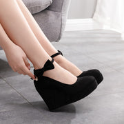 High Wedge Bowtie Pumps